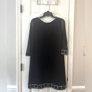 NWOT TIANA B Black Cocktail/Party Dress with embellished sleeves/hem. Size (6).